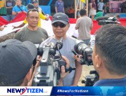 HUT TNI ke-79, Kapolda Gorontalo Hadiri Pengibaran Bendera 200 Meter di Pesisir dan Bawah Laut