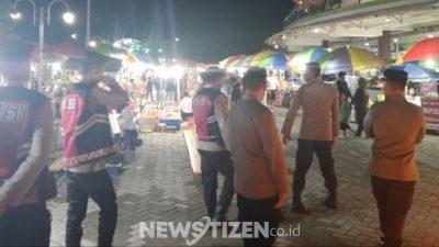 Polisi Hadir di Tengah Hiruk Pikuk Pasar Malam Limboto, Warga Nikmati Hiburan dengan Rasa Aman